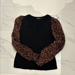 GENERATION LOVE black top with leopard print sleeves with ruffle design